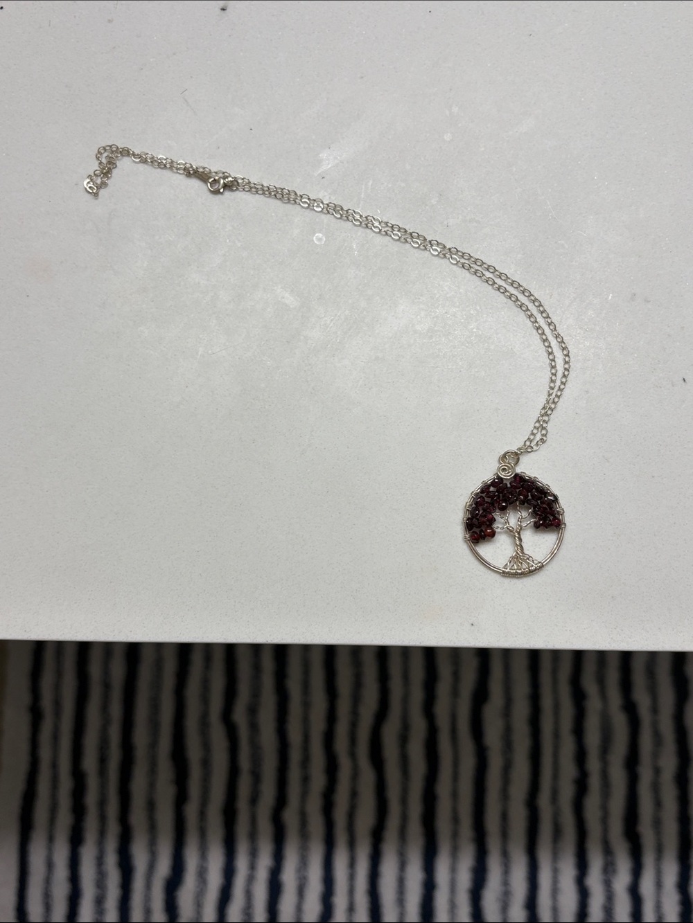Silver Tree of Life Necklace with Dark Red Gem Accents